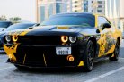 Yellow Dodge Challenger V6 2018 for rent in Ajman 1